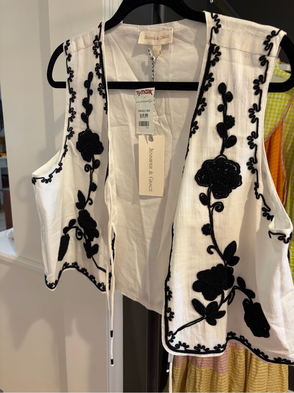 Cute black and white embroidered vest